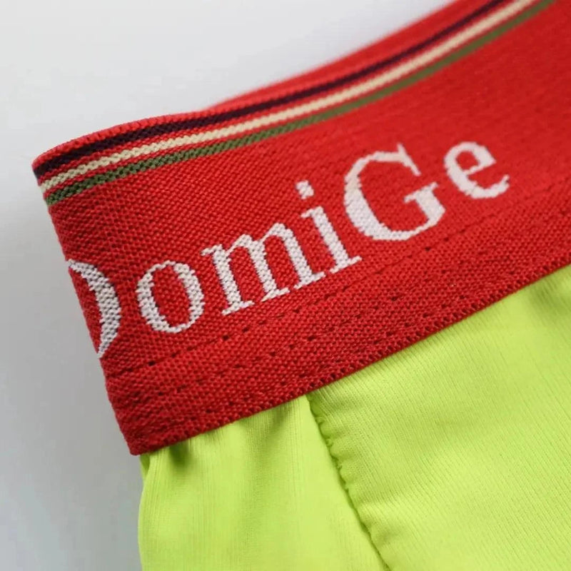 DomiGe logo elastic waistband detail — U-pouch boxer brief bright green mid-waist