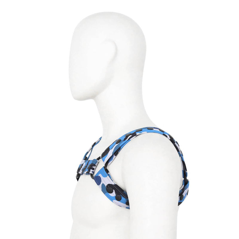 Rear view of DomiGe blue leather body harness — ergonomic strap placement for unrestricted movement side