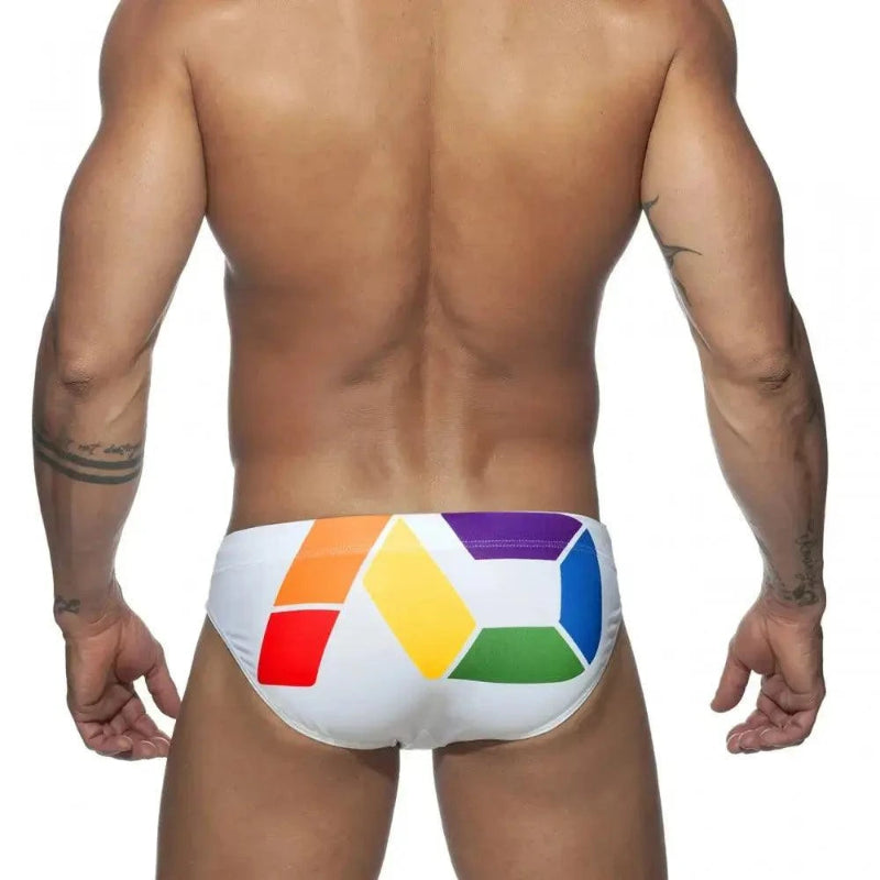 DomiGe men's solid swim briefs in white — model rear view
