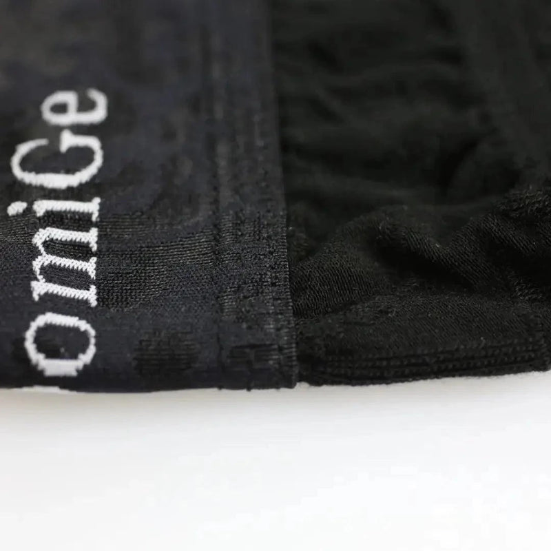 Bamboo fiber fabric texture close-up — naturally antibacterial breathable DomiGe Black