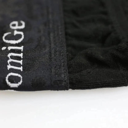 Bamboo fiber fabric texture close-up — naturally antibacterial breathable DomiGe Black