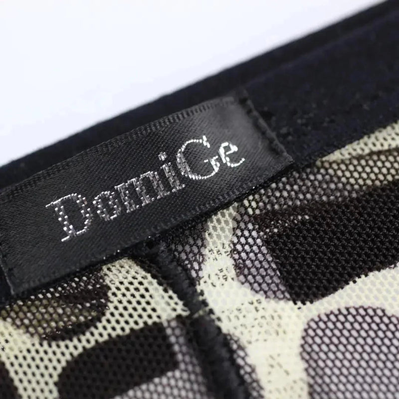 Breathable micromesh fabric texture close-up — perforated cooling jockstrap DomiGe Lepoard
