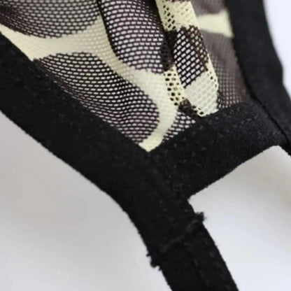 Breathable micromesh fabric texture close-up — perforated cooling jockstrap DomiGe Lepoard details