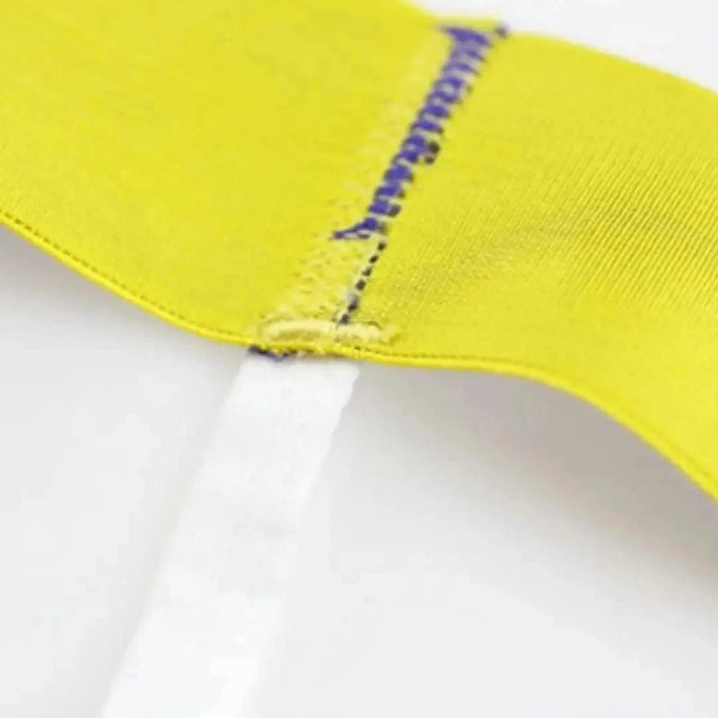 DomiGe logo elastic waistband close-up — T-back thong blue line