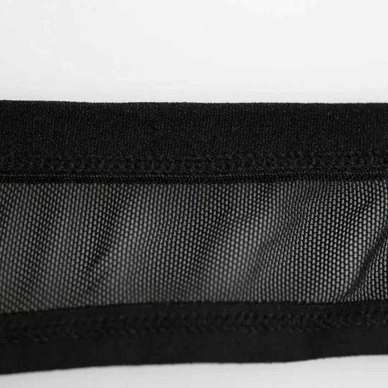 DomiGe logo elastic waistband close-up — low-rise mesh jockstrap black