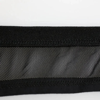 DomiGe logo elastic waistband close-up — low-rise mesh jockstrap black