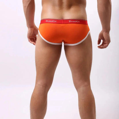 DomiGe low-rise modal briefs back view — red and white logo waistband u-pouch Orange