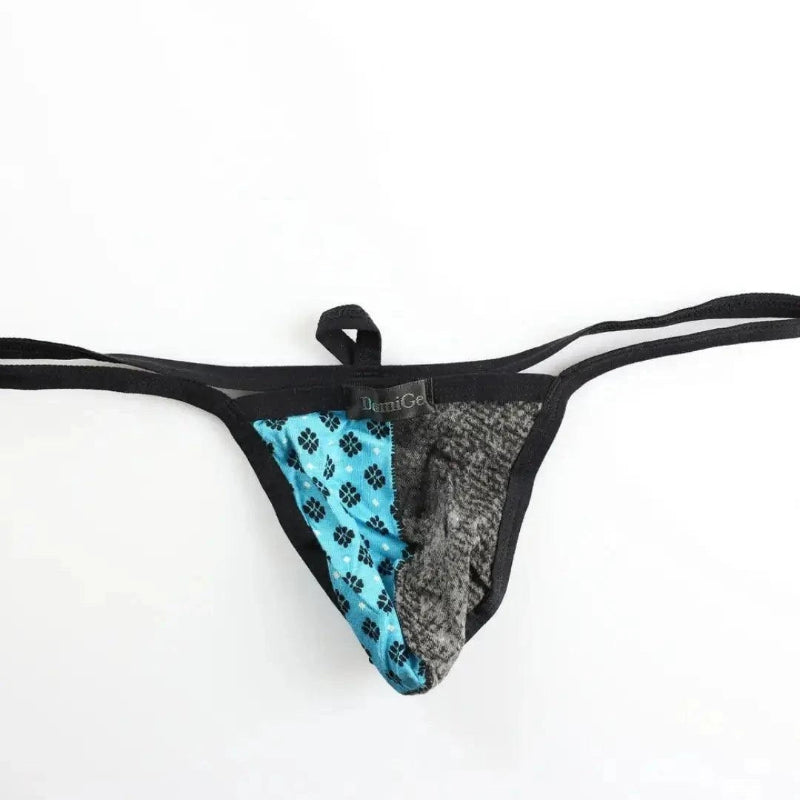 DomiGe modal T-back thong front view — soft stretch fabric contour pouch Black Flat