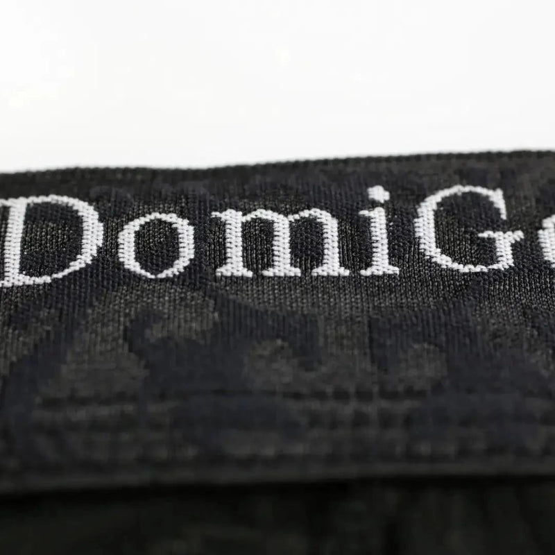 DomiGe signature logo elastic waistband close-up — bamboo briefs mid-rise Black