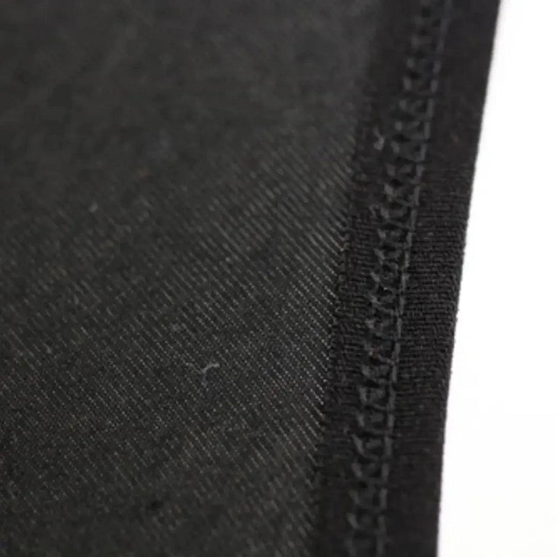Embossed logo elastic waistband close-up — modal low-rise briefs DomiGe black line