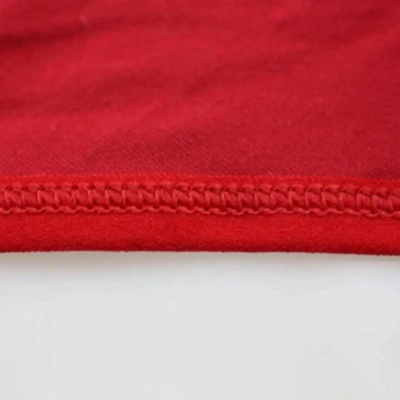 Embossed logo elastic waistband close-up — modal low-rise briefs line DomiGe Red      