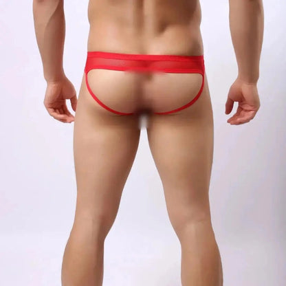 Model wearing DomiGe mesh jockstrap back view — open-back leg straps
