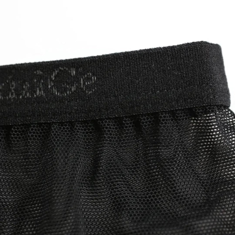 Semitransparent micro-mesh sheer fabric texture — lightweight breathable DomiGe briefs Black