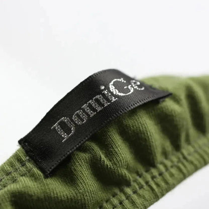 Side personality strap detail close-up — cotton thong bold seductive design DomiGe Army Green