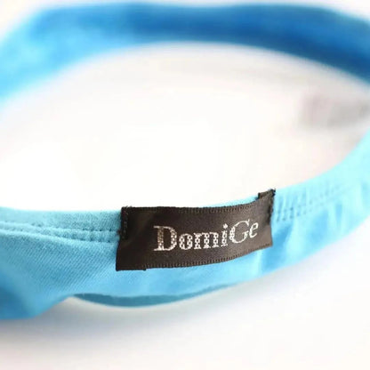 Side personality strap detail close-up — cotton thong bold seductive design DomiGe Sky Blue