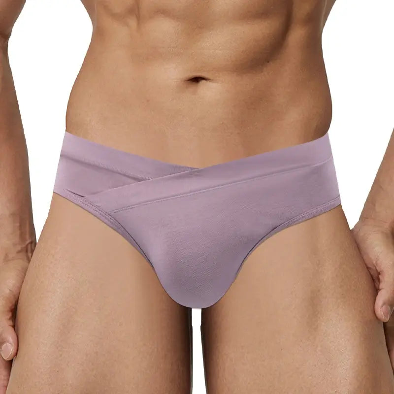 Dusky Pink seamless low rise briefs on male model, front view - Adannu AD330