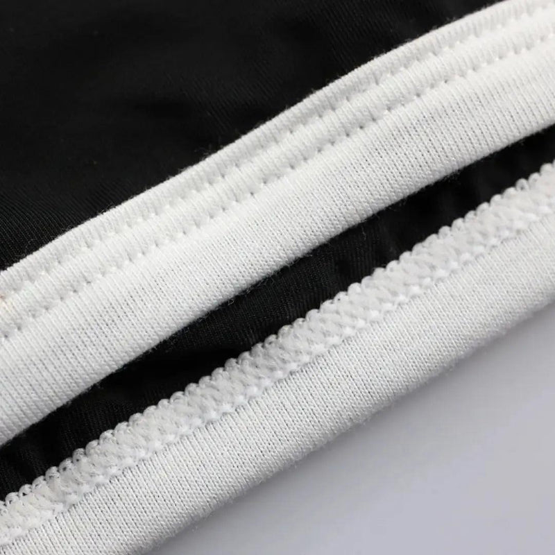 DomiGe breathable stretch fabric texture close-up — U-pouch boxer brief black moisture-wicking	