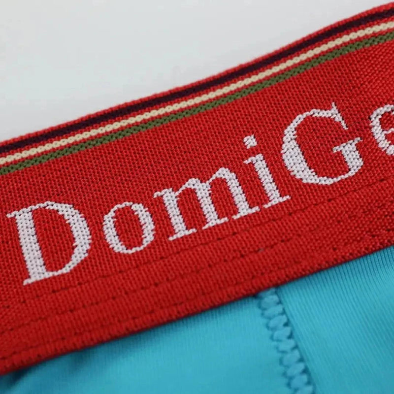 DomiGe logo elastic waistband detail — U-pouch boxer brief sky blue mid-waist	