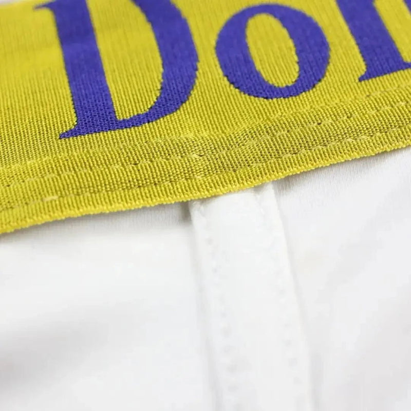 DomiGe logo elastic waistband detail — U-pouch boxer brief white mid-waist	