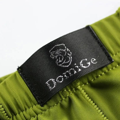 DomiGe mid-waist elastic waistband detail — laser-cut boxer shorts army green	