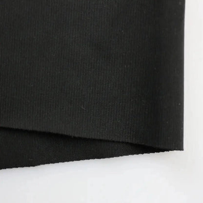 DomiGe lightweight woven fabric texture close-up — breathable laser-cut boxer shorts black	