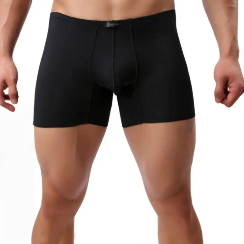 DomiGe laser-cut boxer shorts black front view — mid-waist elastic waistband seamless leg openings model	