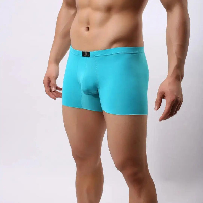DomiGe laser-cut boxer shorts sky blue side view — relaxed loose-fit profile seamless legs model	