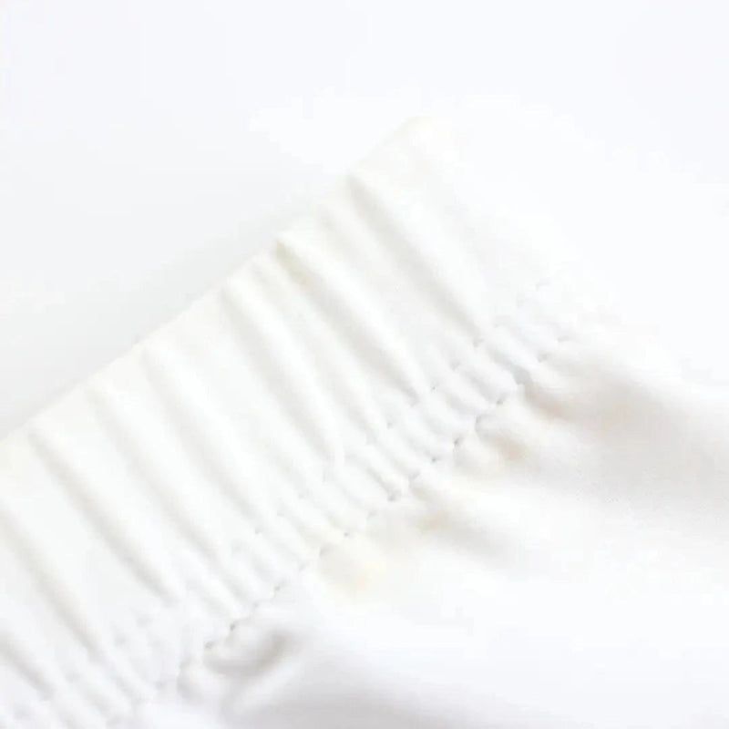 DomiGe lightweight woven fabric texture close-up — breathable laser-cut boxer shorts white	
