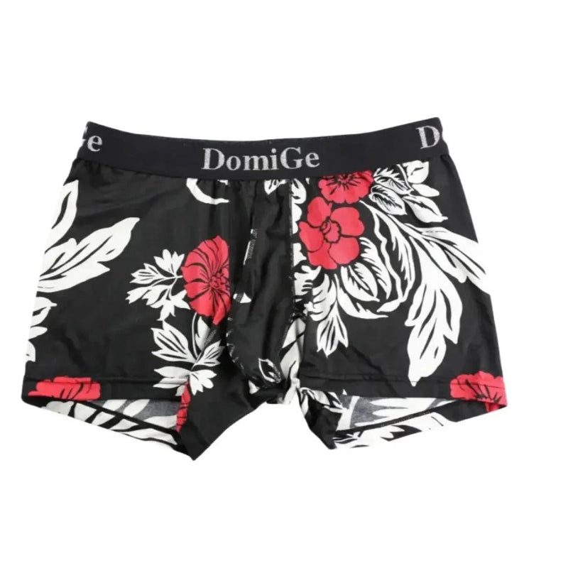 DomiGe printed boxer shorts product flat lay — silver logo waistband full design	