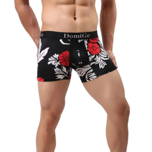 DomiGe printed boxer shorts front view — silver logo waistband loose-fit model	