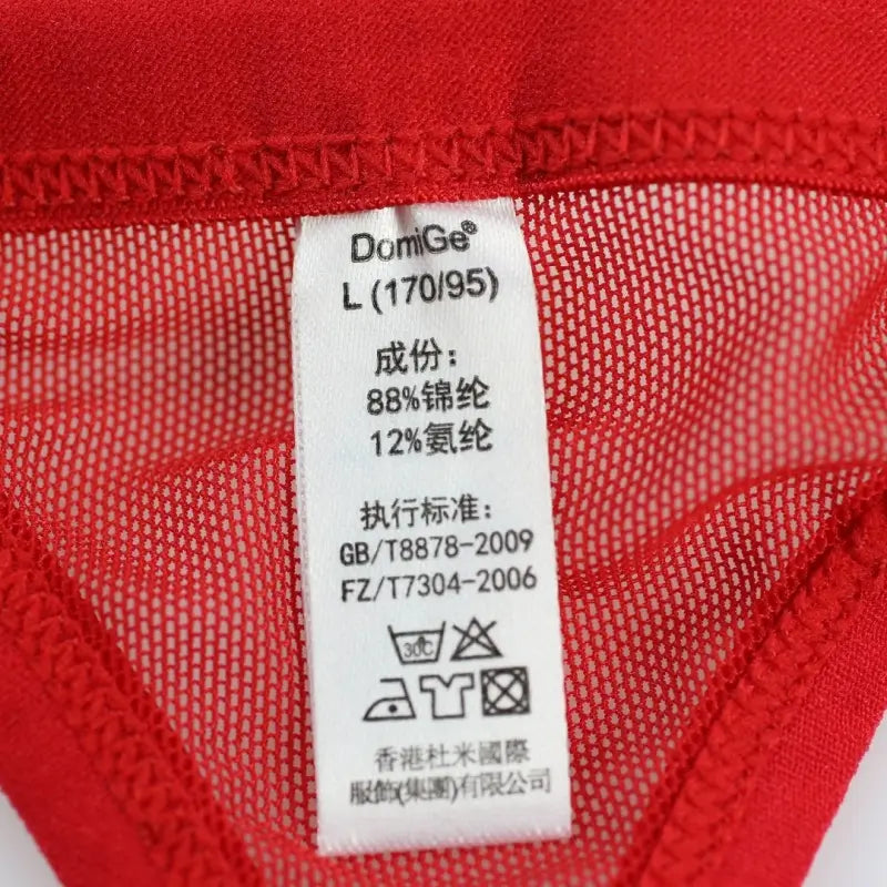 DomiGe hollow-design bikini brief red fabric texture close-up — stretch microfiber breathable	