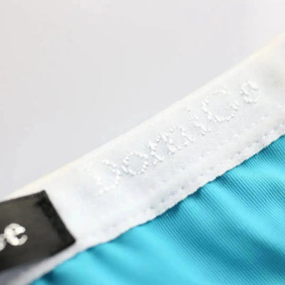 Ice silk nylon fabric texture close-up blue — cooling moisture-wicking briefs DomiGe	