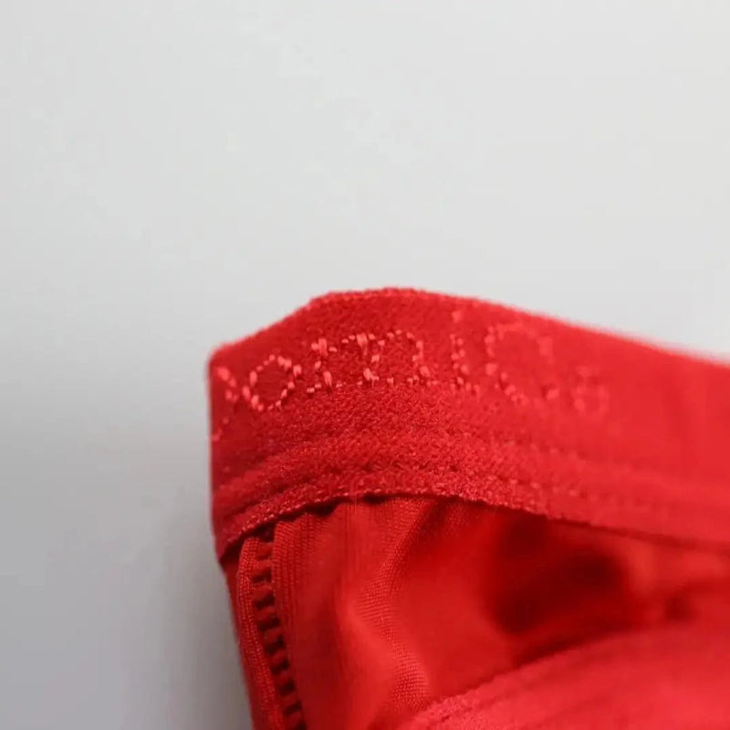 Ice silk nylon fabric texture close-up red — cooling moisture-wicking briefs DomiGe	