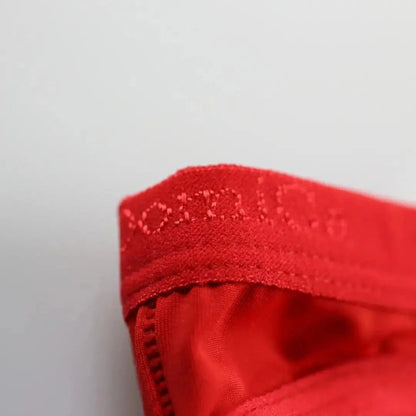 Ice silk nylon fabric texture close-up red — cooling moisture-wicking briefs DomiGe	