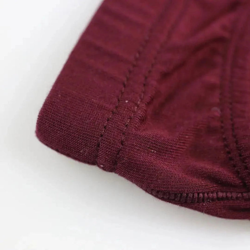 Lenzing modal fabric texture close-up burgundy — 3x softer than cotton breathable brief DomiGe	