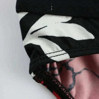 DomiGe black precision print pattern close-up — refined detailing briefs	