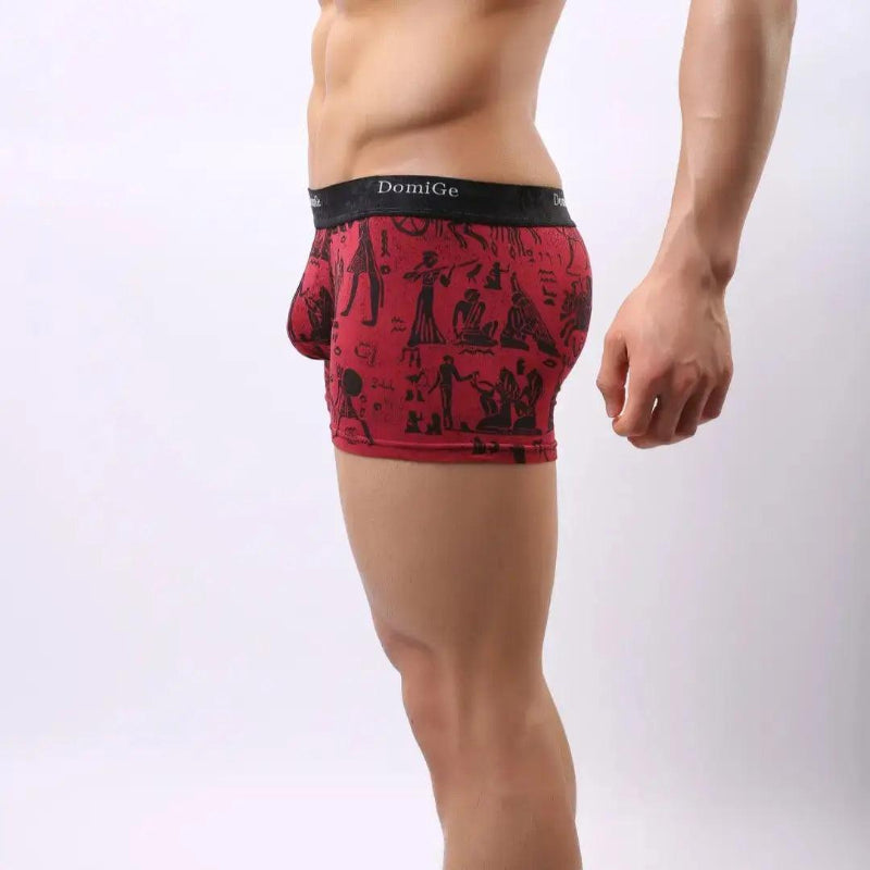 Side view of men's bamboo boxer briefs in red print — DomiGe mid-rise fit with seamless leg opening	