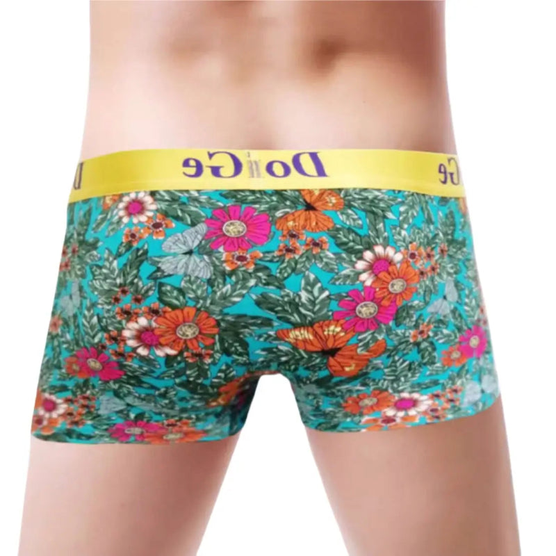 DomiGe blue floral boxer briefs back view — one-piece back panel, yellow blue-logo waistband, finished leg openings	