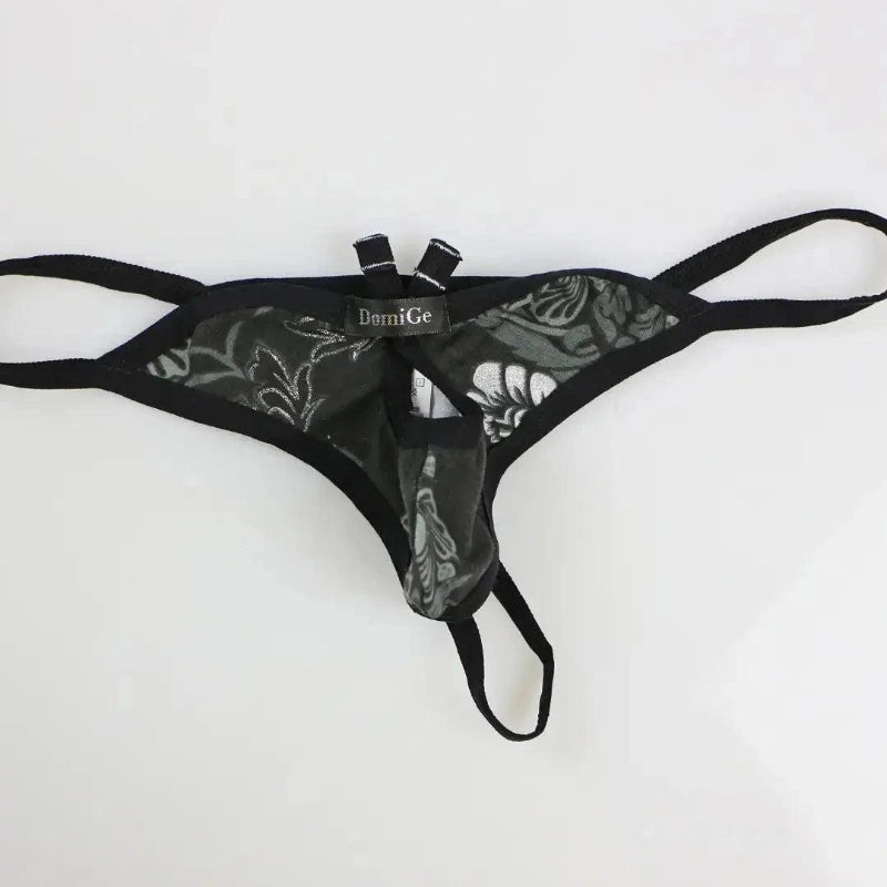 DomiGe butterfly g-string thong lifestyle — black and royal blue colorways, front opening g-string with butterfly antenna design	