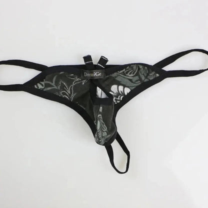 DomiGe butterfly g-string thong lifestyle — black and royal blue colorways, front opening g-string with butterfly antenna design	
