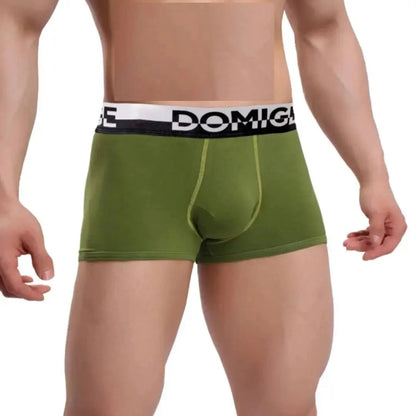 DomiGe cotton boxer briefs turtle shell pouch in army green — model front view showing contoured design and silver waistband	