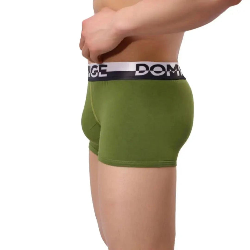 DomiGe cotton boxer briefs turtle shell pouch in army green — model side view showing silver logo waistband	
