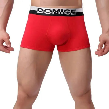 DomiGe cotton boxer briefs turtle shell pouch in red — model front view showing contoured design and silver waistband	
