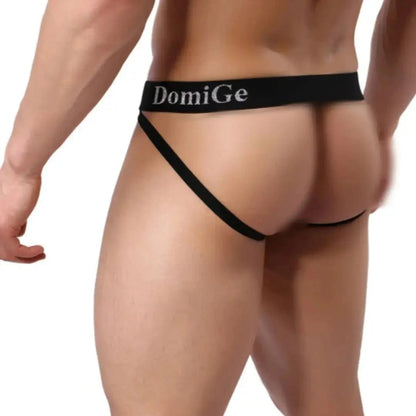 DomiGe cotton lycra jockstrap in green — model rear view showing W-shape cross-strap design	