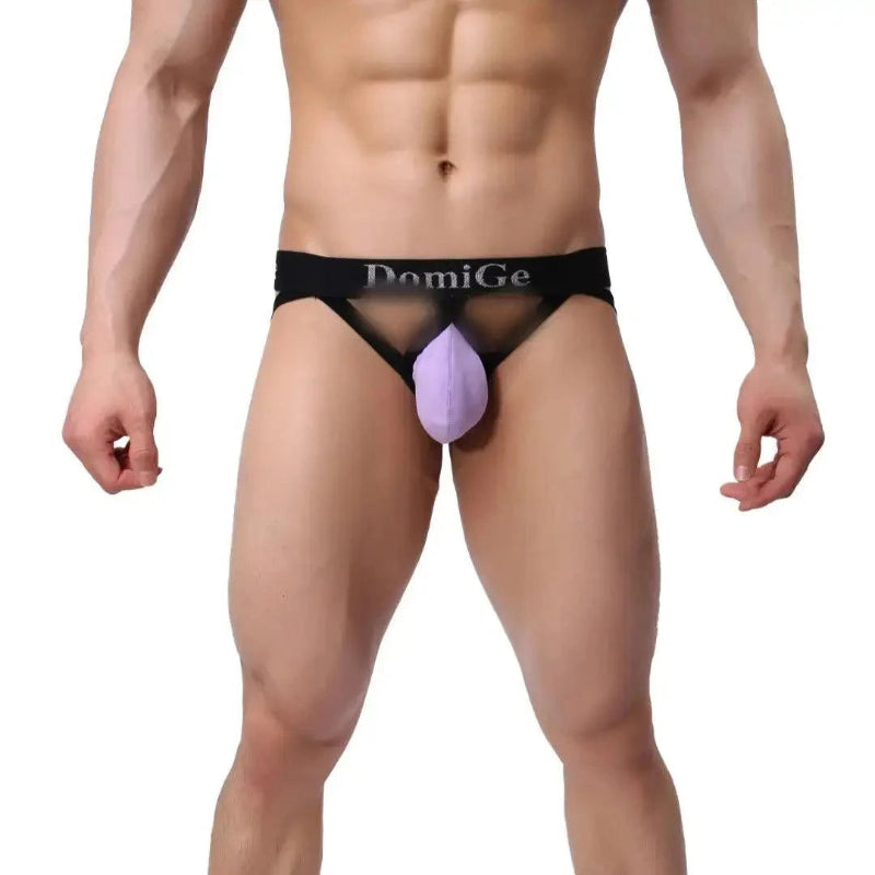 DomiGe cotton lycra jockstrap in purple — model front view showing 3D shield cut pouch	