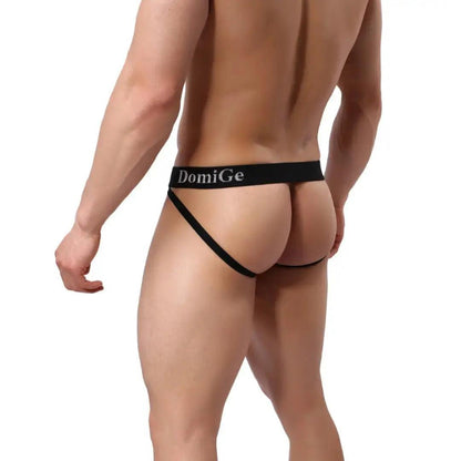 DomiGe cotton lycra jockstrap in red — model rear view showing W-shape cross-strap design	