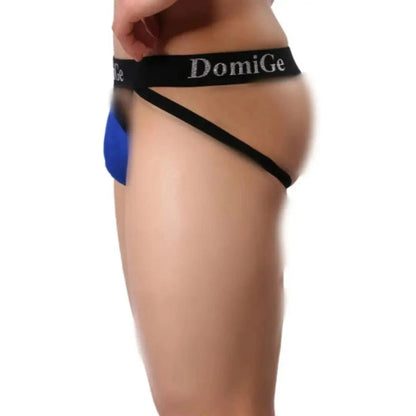 DomiGe cotton lycra jockstrap in royal blue — model rear view showing W-shape cross-strap design	