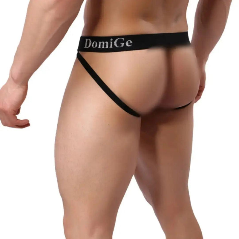 DomiGe cotton lycra jockstrap in yellow — model rear view showing W-shape cross-strap design	
