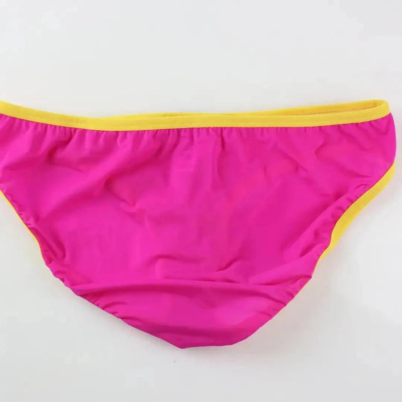 DomiGe elephant cock sock briefs in rose red — flat lay side view showing contoured pouch and waistband	