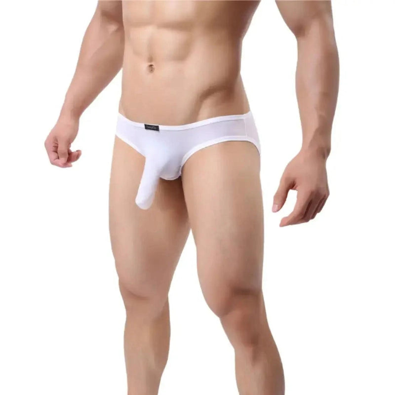 DomiGe elephant cock sock pouch briefs in white — model side view showing low-rise fit and contoured pouch	